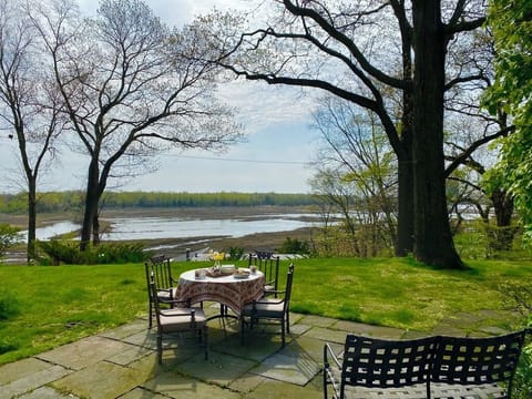 Terrace dining alfresco at high tide.