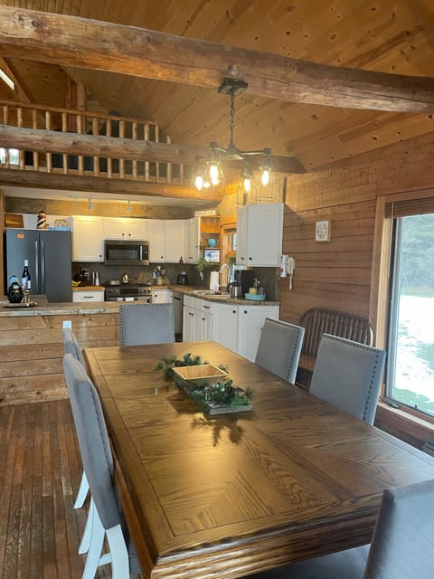 Dining area- seats 10 with benches.(extra folding table & 4 chairs in closet)