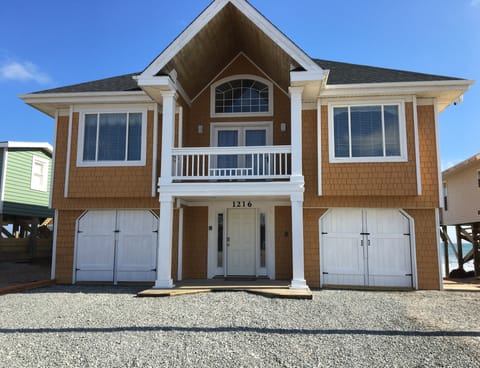 Front of the house with 3 parking spots