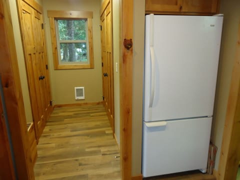 Laundry area and extra fridge