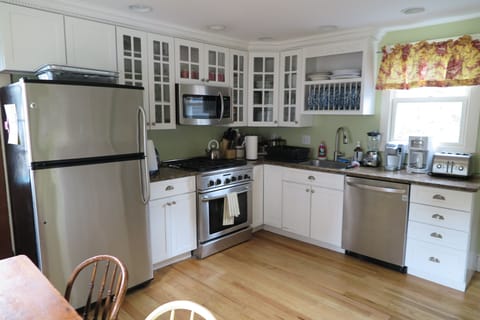 Kitchen with stainless steel appliances and granite countertop