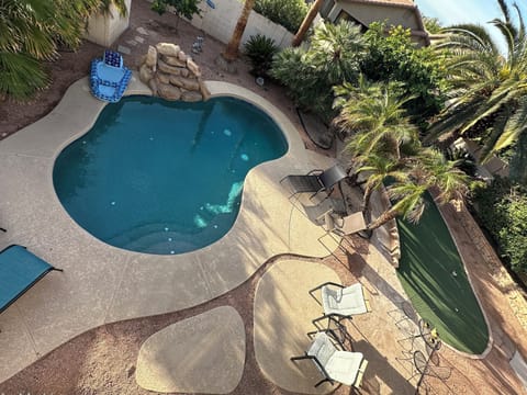 Backyard Oasis with the perfect combination of sun, shade, water and fun!