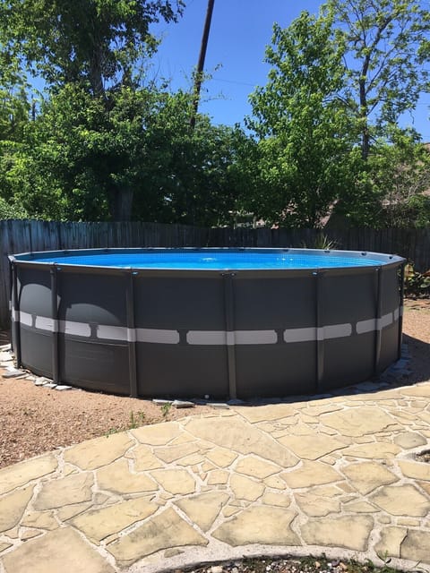 The pool is 18ft in diameter and approximately 4 ft deep.