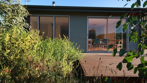 House set amongst native garden