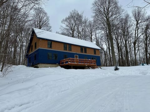 Winter exterior view of The Cabin at Killington, our vacation rental home in Killington, Vermont.