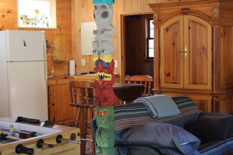 Game  room, additional sleeping, sink and half bath