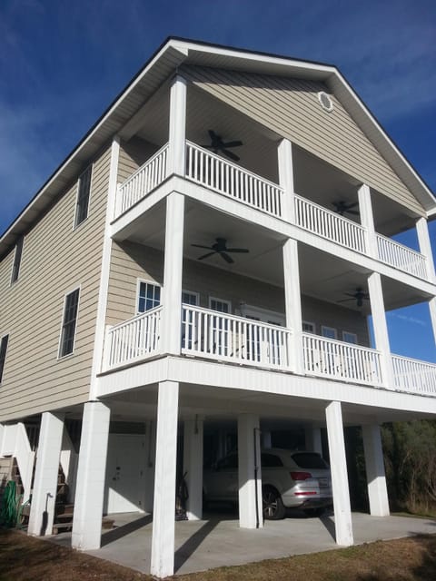 From the back, large decks facing the causeway!