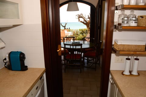 Kitchen next to dining room.