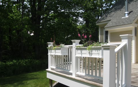Private and comfortable outdoor deck. Perfect for lounging and dining.