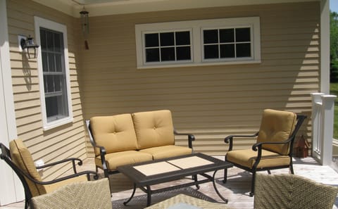 Wake up to morning sunshine on the spacious deck off the kitchen.