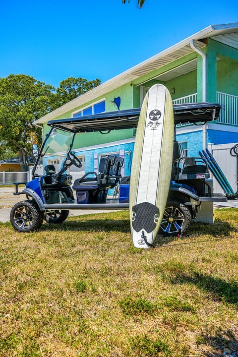6 passenger golf cart and beach toys, umbrellas, chairs, boogie boards, cart