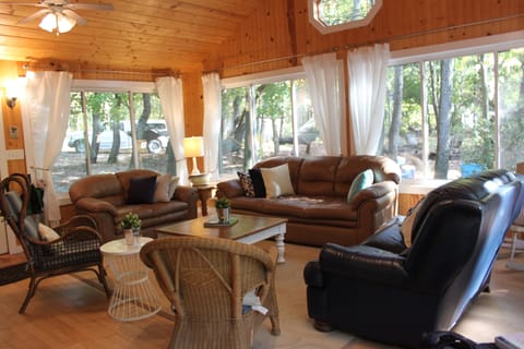 Main house living room area complete with queen sleeper sofa.