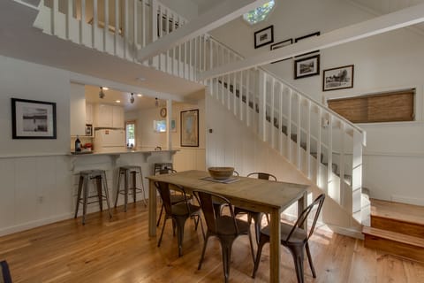 RH dining room table opens up for a larger gathering over the holidays.