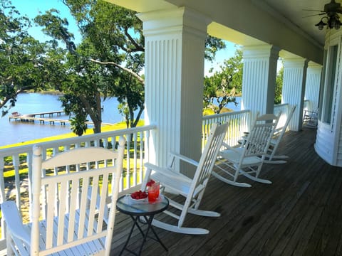  Tensions melt away when relaxing on the wrap around porch any time of the day!