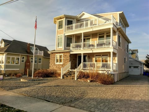 Street view of house from J street. Parking for 5 cars, 2 houses from beach