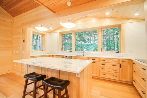 New Kitchen with induction cooktop, wall oven, dishwasher, microwave, great view