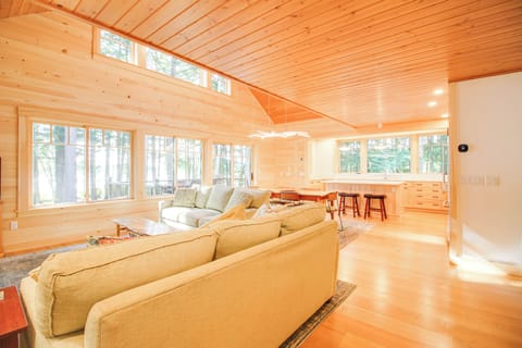 living, dining, kitchen & great sunny views of the lake