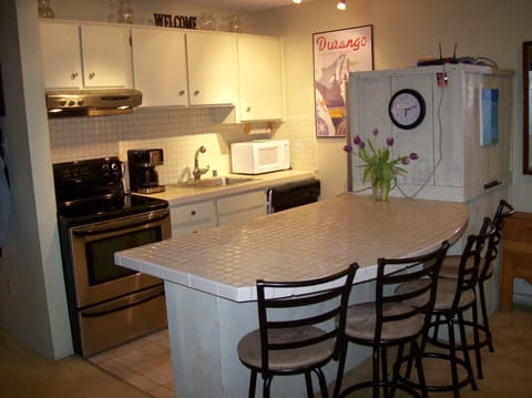 Bar seating for 4 to augment table seating (4 also)