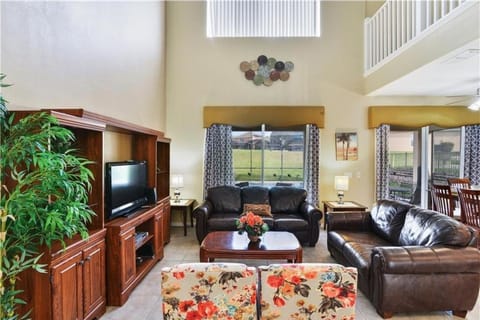 Family room with two story open foyer