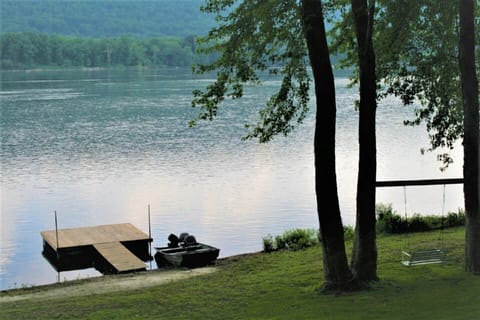 Directly on the river front with private dock and swing on the riverbank