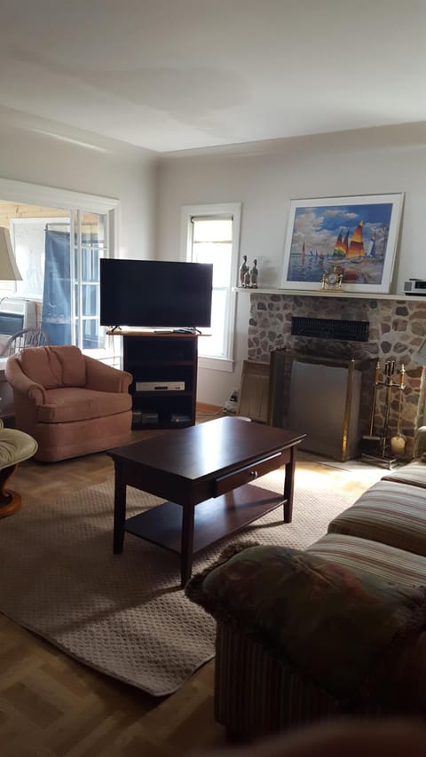 Living room is cozy, with High-def TV, Dish Network, and Wi-Fi