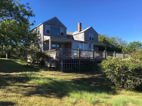 Stewpot sitting on a hill overlooking Quidnet Village and ocean