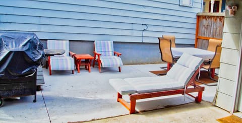 Backyard patio with seating and gas BBQ