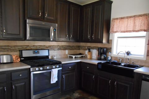 Fully equipped kitchen - dishwasher, garbage disposal, fridge,  and 
gas stove 