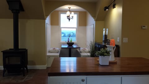 Dining dormer and wood stove.