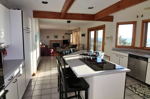 Water views in the kitchen and living room beyond