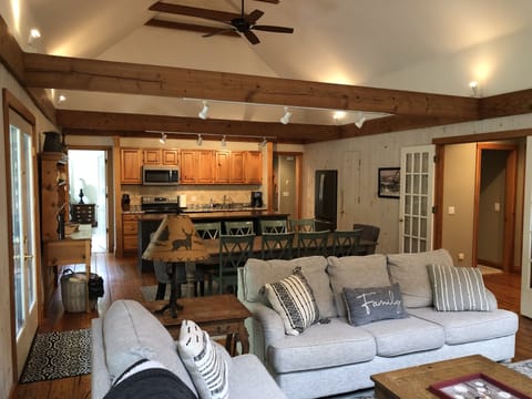 Bunk rm, queen rm and full bath through the french doors on the right. 