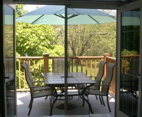 Tree top deck off living room with Webber Grill.