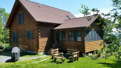 Main entrance to house via 3 Season enclosed Porch 