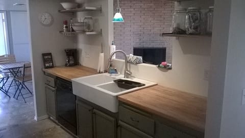 Large Farmhouse Sink & dishwasher in kitchen, micro, toaster, coffee maker, etc