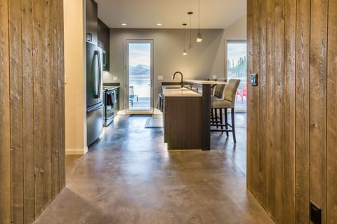 Large doors and a large deck combine to provide lots of indoor/outdoor space