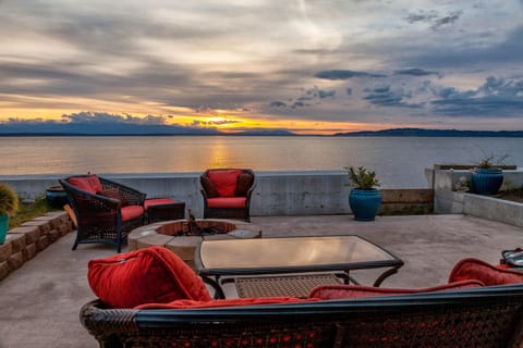 Beach Patio: Take in slowly changing sunsets mingled with burning fire & waves
