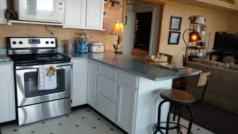 Kitchen view into the TV area. 