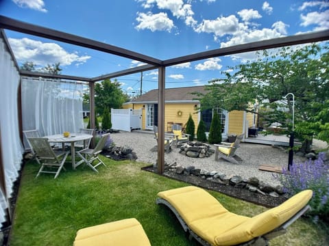 Welcome to Plum Island Cottage! A private  house with a backyard and deck.