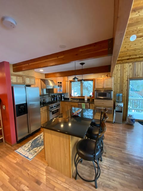 Open kitchen with bar