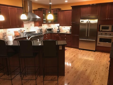 Chef’s Kitchen with Viking Stainless Steal Appliances