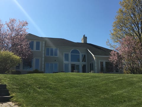 Back of house which facesWest Bay