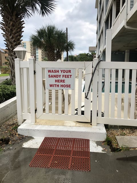 Out door shower to wash the sand off. 