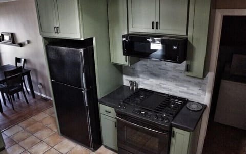 Gas range and microwave with all your cooking needs. 