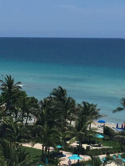 On the beach, sun loungers, beach towels