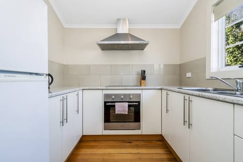 Kitchen, adjacent to dining room.