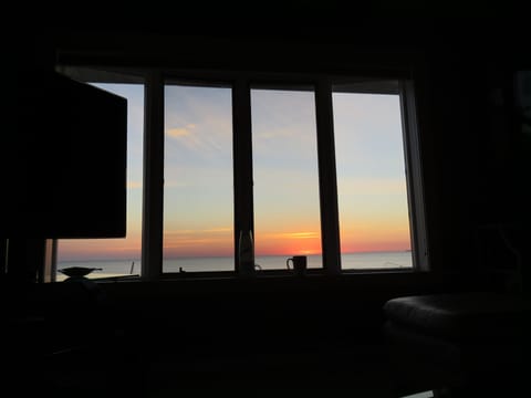 Sunrise from living room couch.
