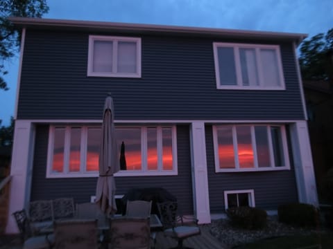 Sunrise reflected in the windows.