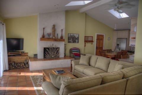 Wood fireplace and plenty of new, comfortable seating for lounge time