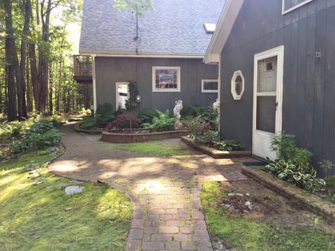 Stone path with side garden.