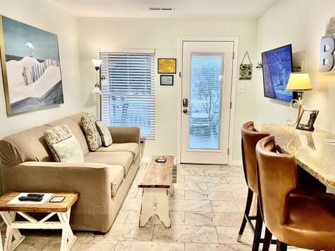 Just off the front of the condo is a 16' porch with pub seating - this is always the most popular room in the condo! 